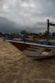   Fishing boat loaded ready todays trip. Watched go each day drop big net then 19 men beach would pull shore hand split catch. trip catch  